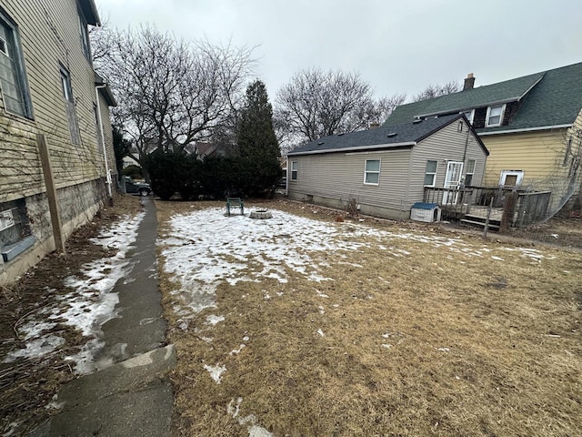 view of yard with a wooden deck