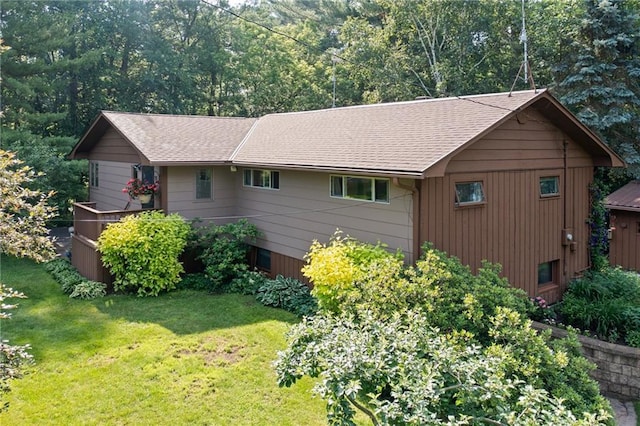 115 Pine Crest Rd, Balsam Lake, WI 54810 - view of side of home featuring a yard and roof with shingles