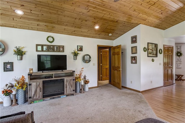 living room featuring vaulted ceiling, recessed lighting, wood ceiling, and baseboards