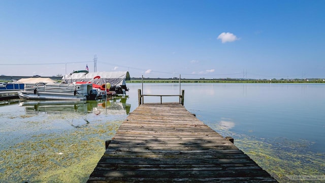 view of dock featuring a water view