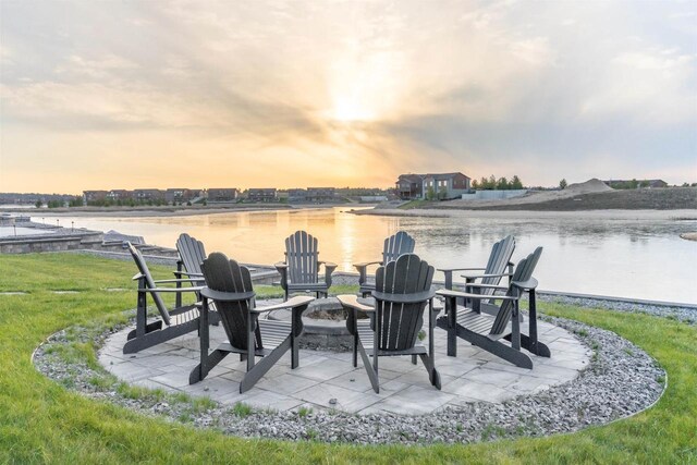 N8791 Lake Cabin Dr, New Lisbon, WI 53950 - patio terrace at dusk with a water view