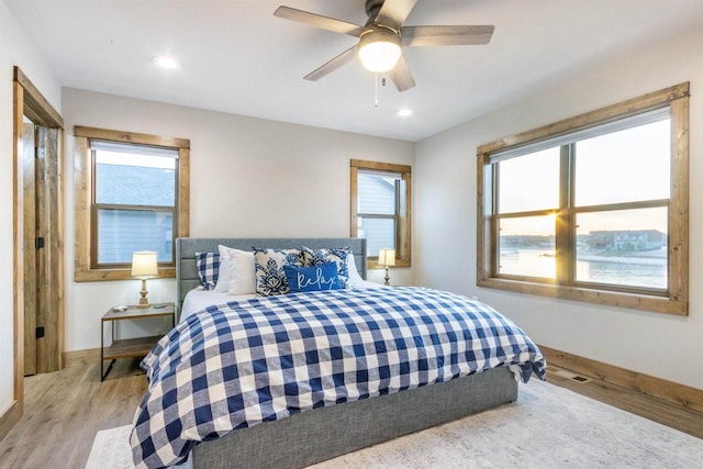 N8791 Lake Cabin Dr, New Lisbon, WI 53950 - bedroom with visible vents, baseboards, a ceiling fan, light wood-style floors, and recessed lighting