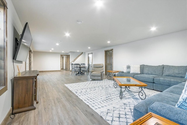 N8791 Lake Cabin Dr, New Lisbon, WI 53950 - living area featuring light wood-style floors, baseboards, and recessed lighting