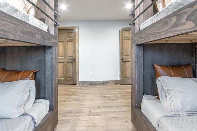 N8791 Lake Cabin Dr, New Lisbon, WI 53950 - bedroom with baseboards and wood finished floors