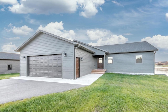 N8791 Lake Cabin Dr, New Lisbon, WI 53950 - single story home with a garage, aphalt driveway, and a front lawn