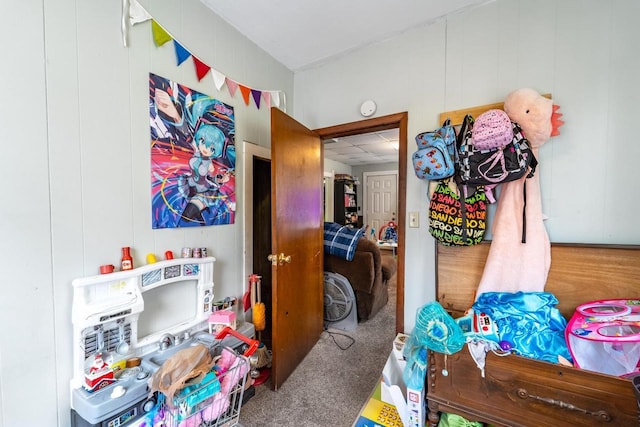 rec room featuring a paneled ceiling