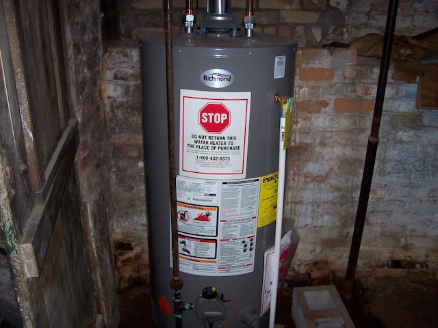 1002 Adams St, Portage, WI 53901 - utility room featuring water heater