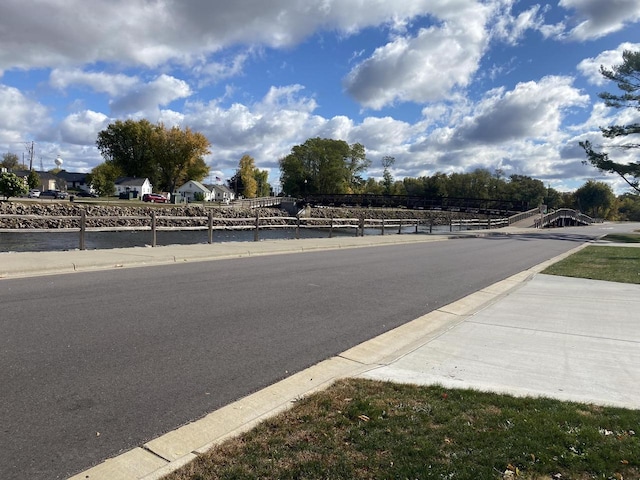 view of road with curbs