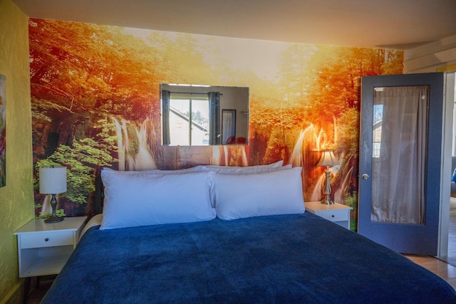 bedroom featuring wallpapered walls