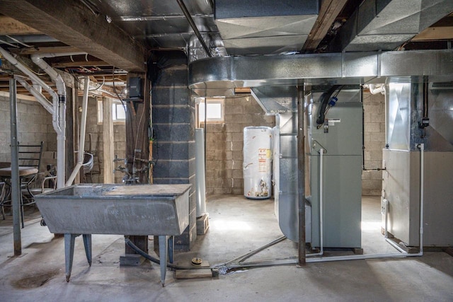 basement with heating unit and water heater