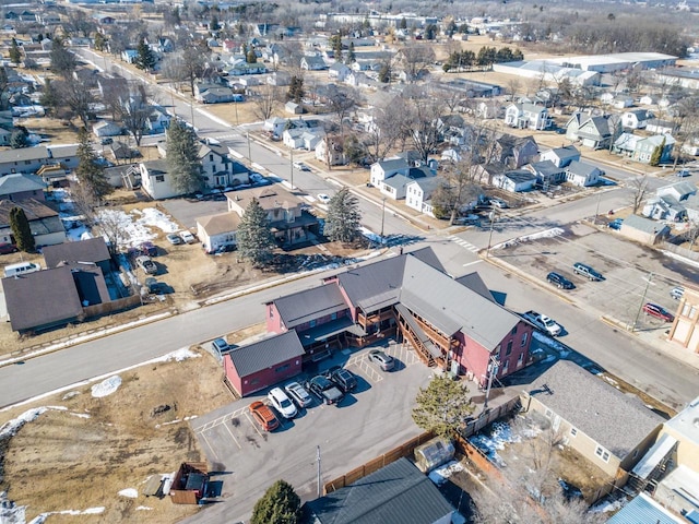 birds eye view of property with a residential view
