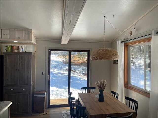 155 Zach St, Glidden, WI 54527 - dining space with vaulted ceiling, light wood-style flooring, and a wealth of natural light