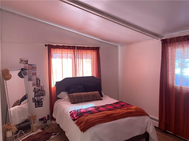 155 Zach St, Glidden, WI 54527 - bedroom featuring a baseboard radiator and vaulted ceiling