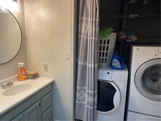 155 Zach St, Glidden, WI 54527 - laundry area featuring laundry area, washing machine and dryer, and a sink