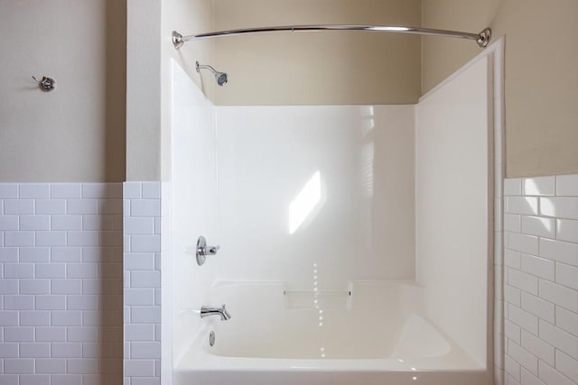 full bathroom with shower / bath combination