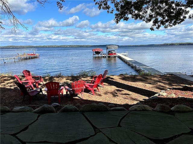 dock area featuring a water view and boat lift