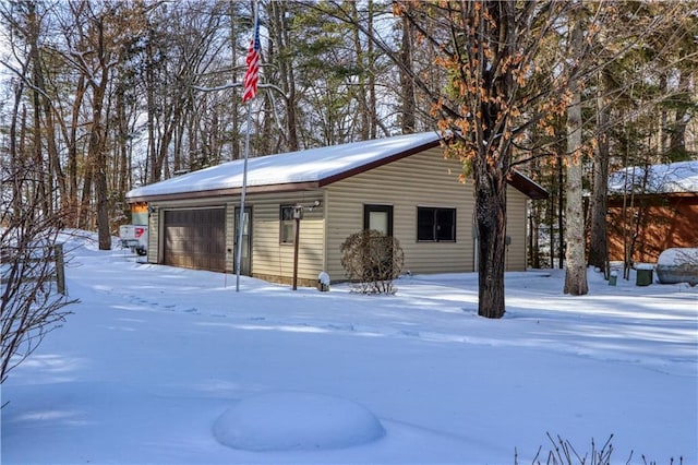 exterior space with a garage