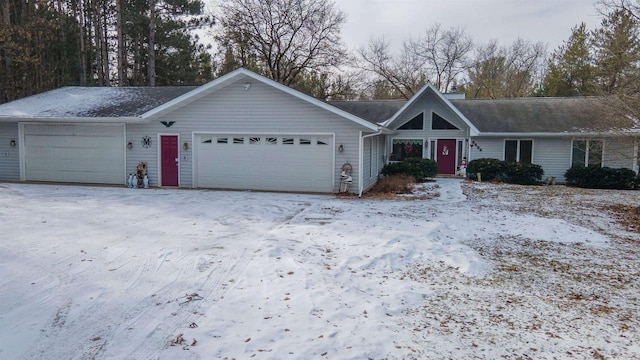 ranch-style home featuring an attached garage