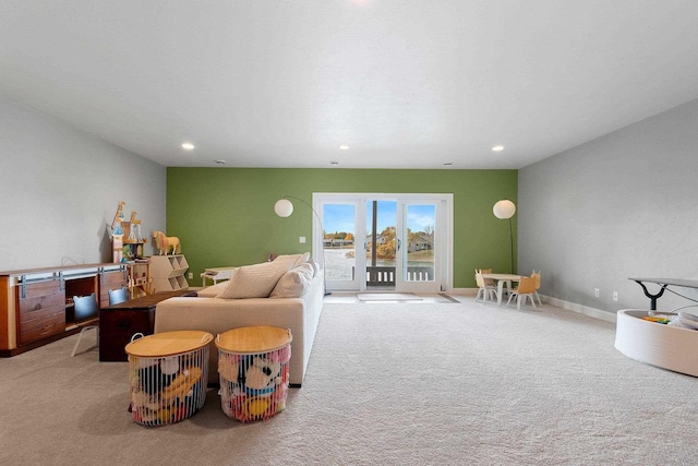 living room with baseboards, carpet flooring, and recessed lighting
