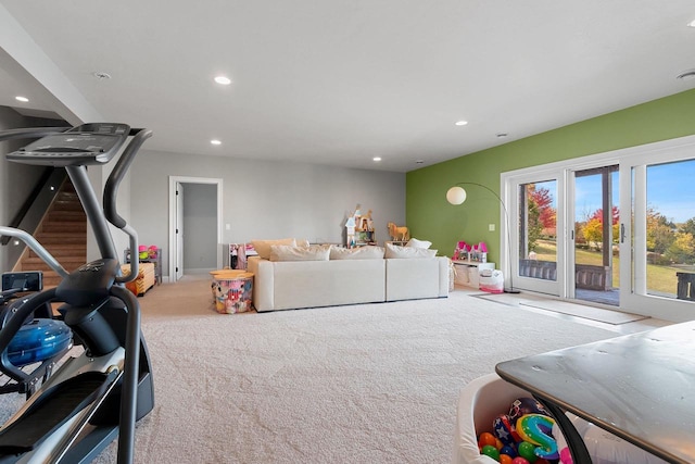 living area featuring recessed lighting and carpet flooring