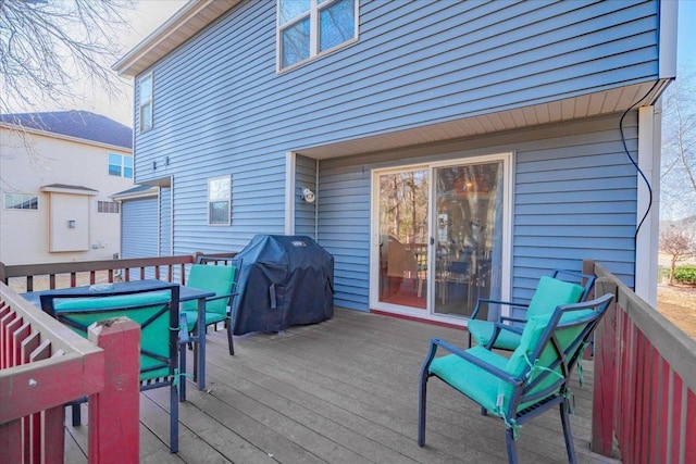 wooden terrace with grilling area