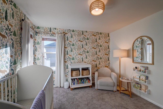 sitting room featuring baseboards, carpet flooring, and wallpapered walls