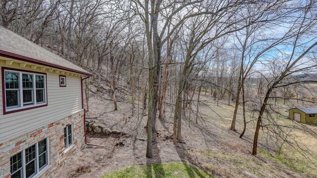4494 Oak Valley Rd, Cross Plains, WI 53528 - exterior space featuring a wooded view and an outbuilding