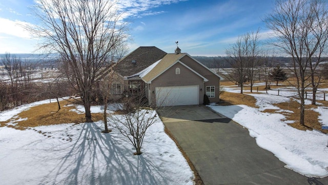 view of front of house with a garage and driveway