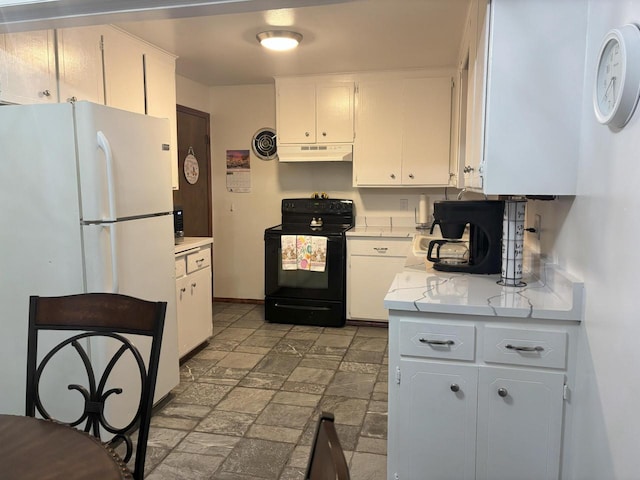 kitchen featuring under cabinet range hood, electric range, white cabinets, light countertops, and freestanding refrigerator