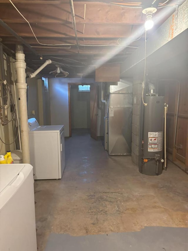 unfinished below grade area featuring water heater and heating unit