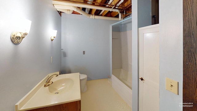 bathroom featuring toilet and vanity