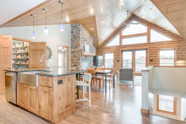 N8111 Castaway Dr, New Lisbon, WI 53950 - kitchen featuring high vaulted ceiling, a wealth of natural light, open floor plan, and a sink
