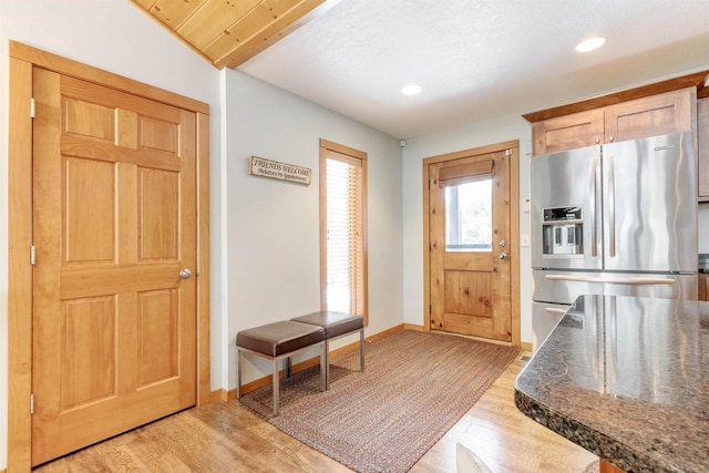 N8111 Castaway Dr, New Lisbon, WI 53950 - foyer entrance with light wood finished floors, baseboards, and recessed lighting