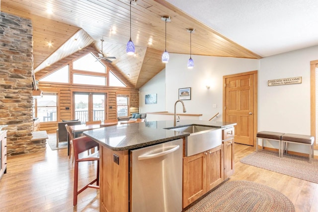 N8111 Castaway Dr, New Lisbon, WI 53950 - kitchen with high vaulted ceiling, a sink, light wood-style floors, log walls, and dishwasher