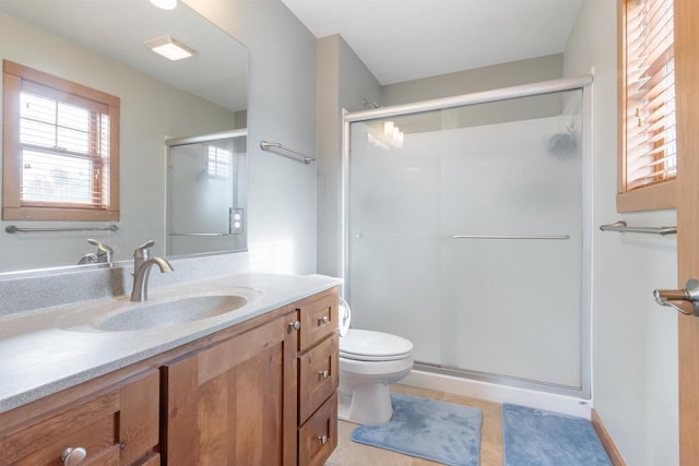 N8111 Castaway Dr, New Lisbon, WI 53950 - full bath featuring toilet, a shower stall, visible vents, and vanity