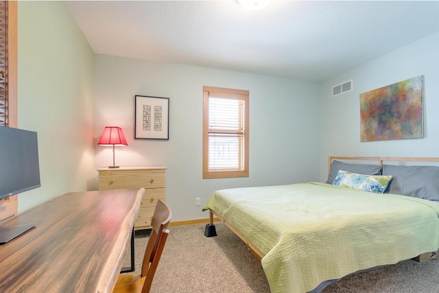 N8111 Castaway Dr, New Lisbon, WI 53950 - bedroom featuring baseboards, visible vents, and carpet flooring