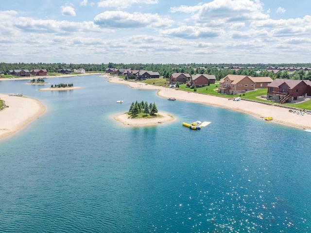 N8111 Castaway Dr, New Lisbon, WI 53950 - drone / aerial view featuring a water view and a residential view