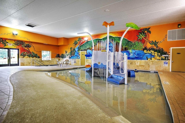 N8111 Castaway Dr, New Lisbon, WI 53950 - interior space with visible vents and french doors