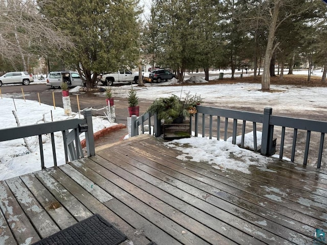 view of snow covered deck