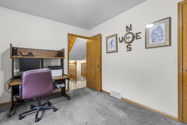 office area featuring baseboards, visible vents, and carpet flooring