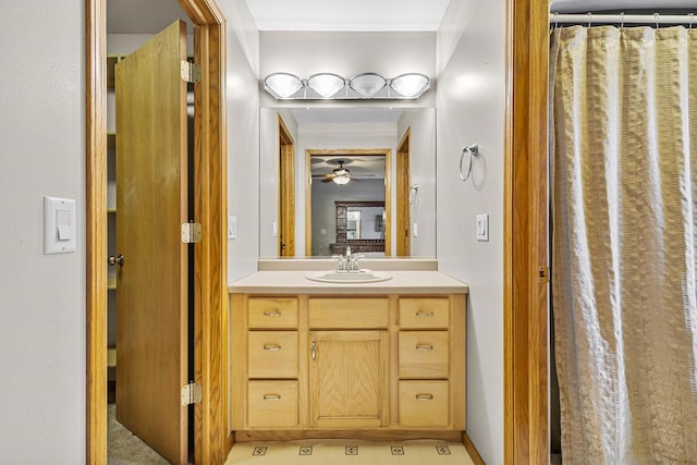 bathroom with a ceiling fan and vanity