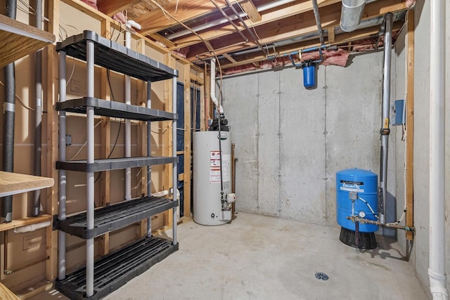 unfinished basement featuring gas water heater