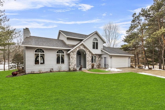 view of front of home with a front yard, stone siding, an attached garage, and concrete driveway