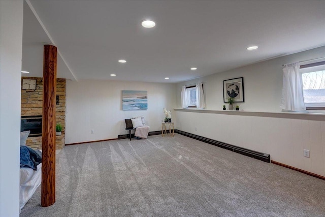 below grade area featuring recessed lighting, baseboards, and carpet floors