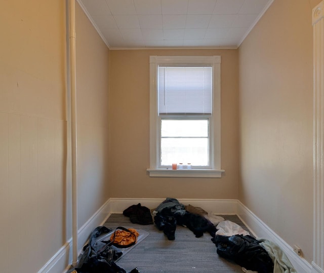 interior space with crown molding