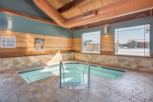 view of pool featuring an indoor hot tub and a swimming pool