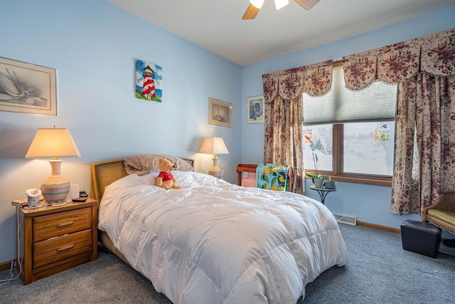 bedroom featuring a ceiling fan, baseboards, visible vents, and carpet flooring