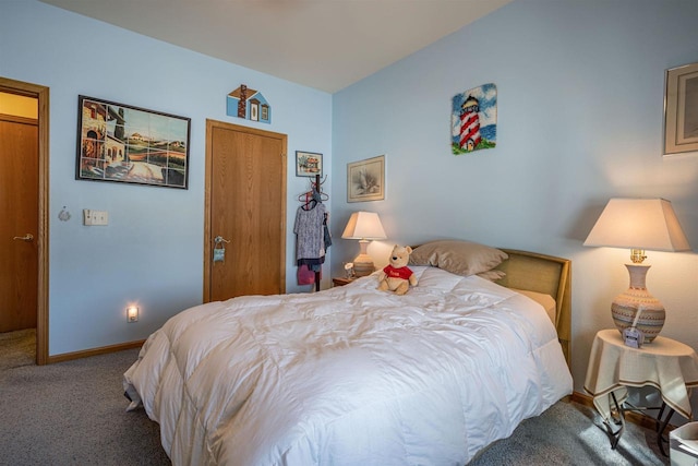 carpeted bedroom with baseboards