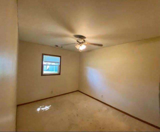 800 Thompson St, Portage, WI 53901 - empty room with ceiling fan and baseboards