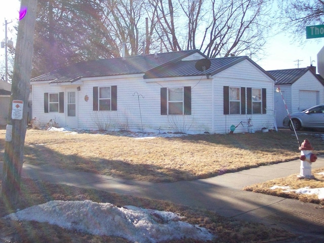 800 Thompson St, Portage, WI 53901 - single story home with a metal roof and a standing seam roof